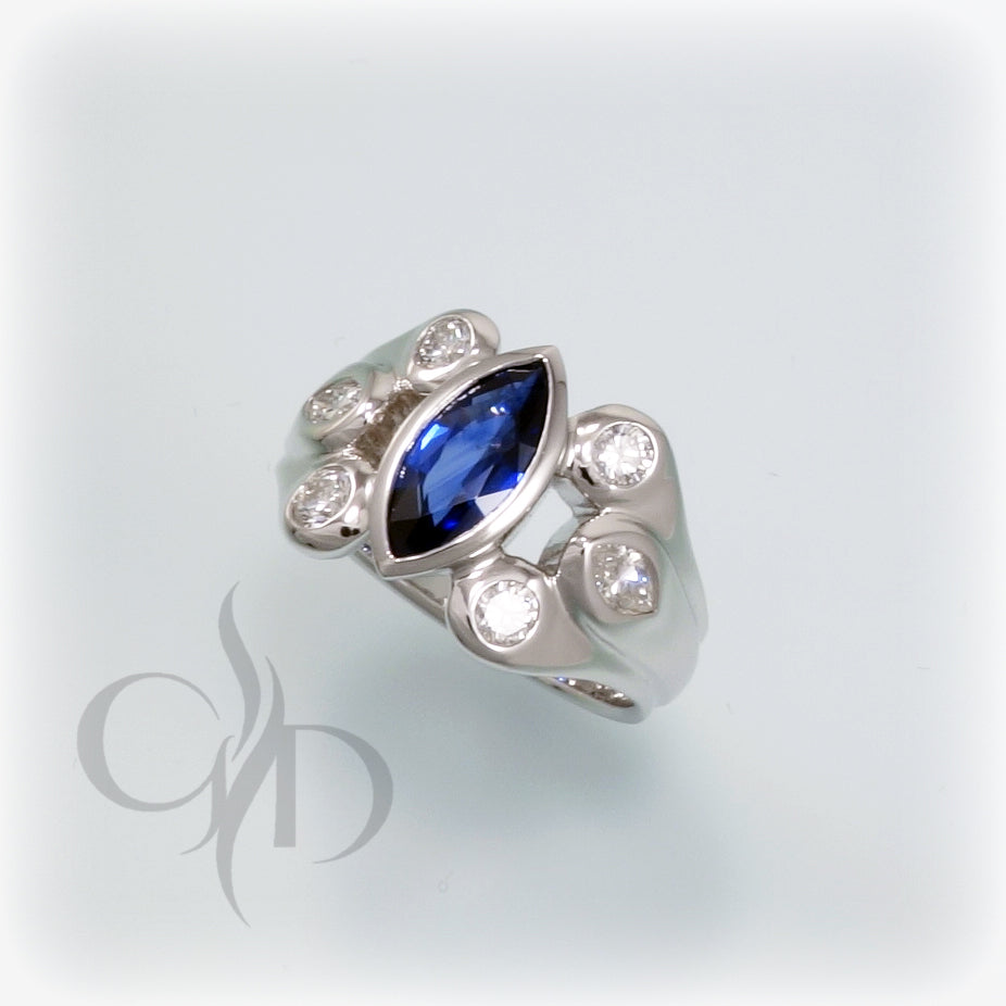 Marquise shaped sapphire and diamond ring