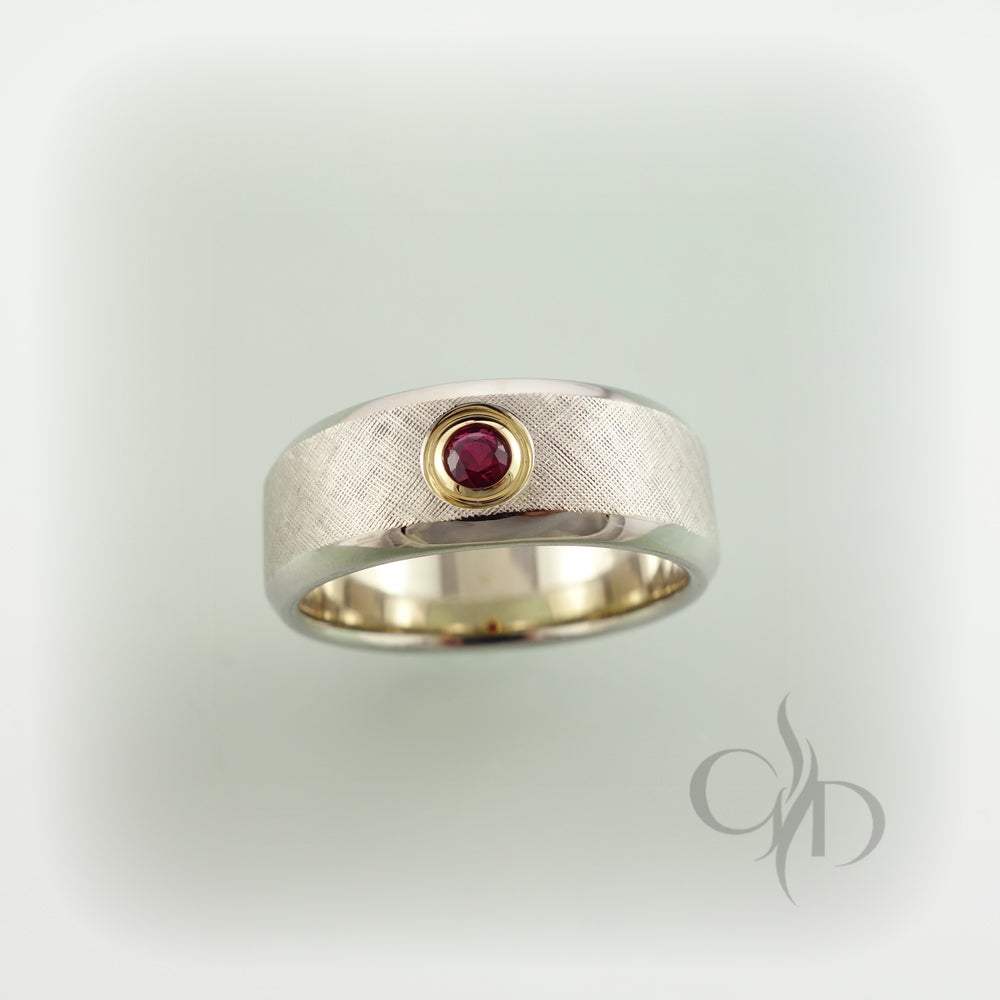 18k white and yellow gold band with inset ruby