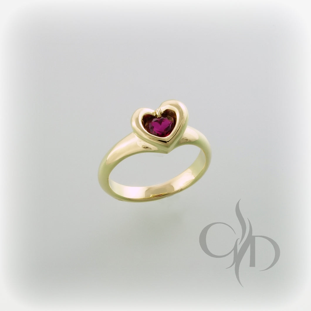 Romantic heart shaped ruby in 18k yellow gold